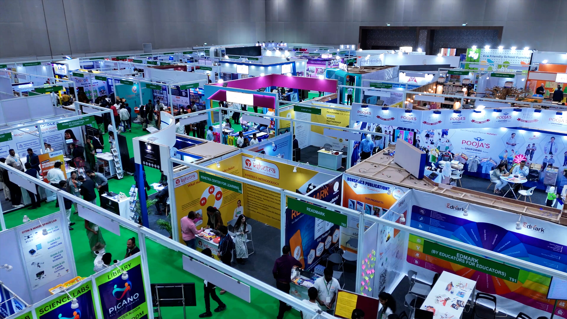 EdTech innovation showcasing students and professionals using advanced learning technology with VR headsets and digital displays